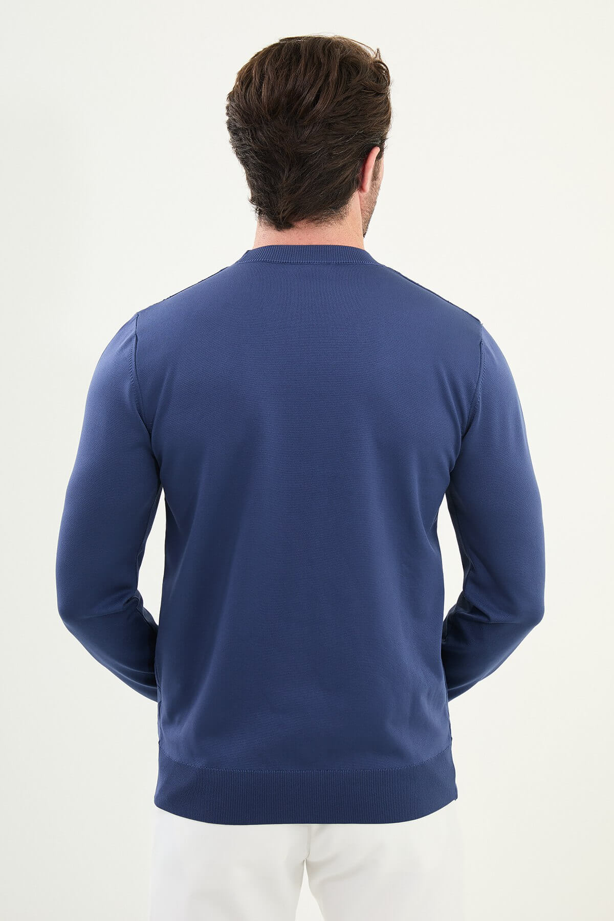 Men’s indigo textured crew neck sweater with geometric knit pattern, slim fit smart casual knit styled with light trousers