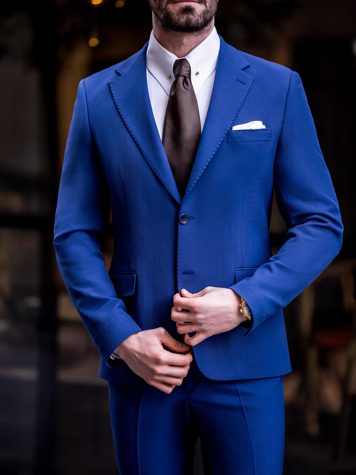 Men’s navy slim-fit 3-piece suit with peak lapel blazer, matching vest and trousers, featuring a double vent design and tailored silhouette for formal and business occasions.