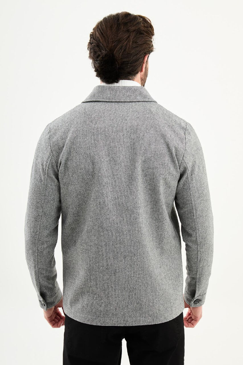 Men’s gray wool blend utility jacket with button-up front and four pockets, regular fit smart casual layering jacket styled with black trousers and white turtleneck sweater