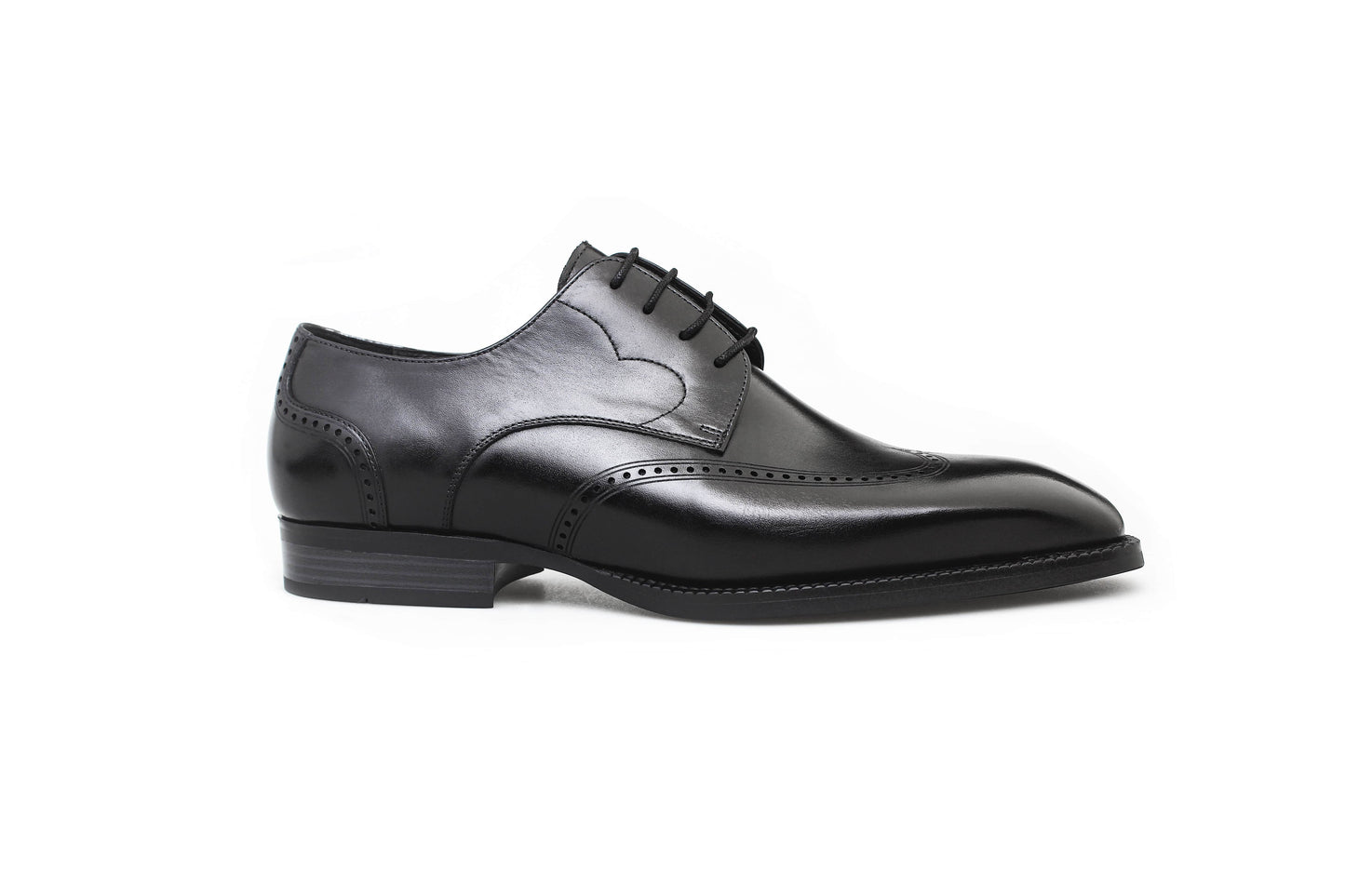 Midnight Brogue Artisan Derby in black leather with intricate brogue details, handcrafted for a refined look.