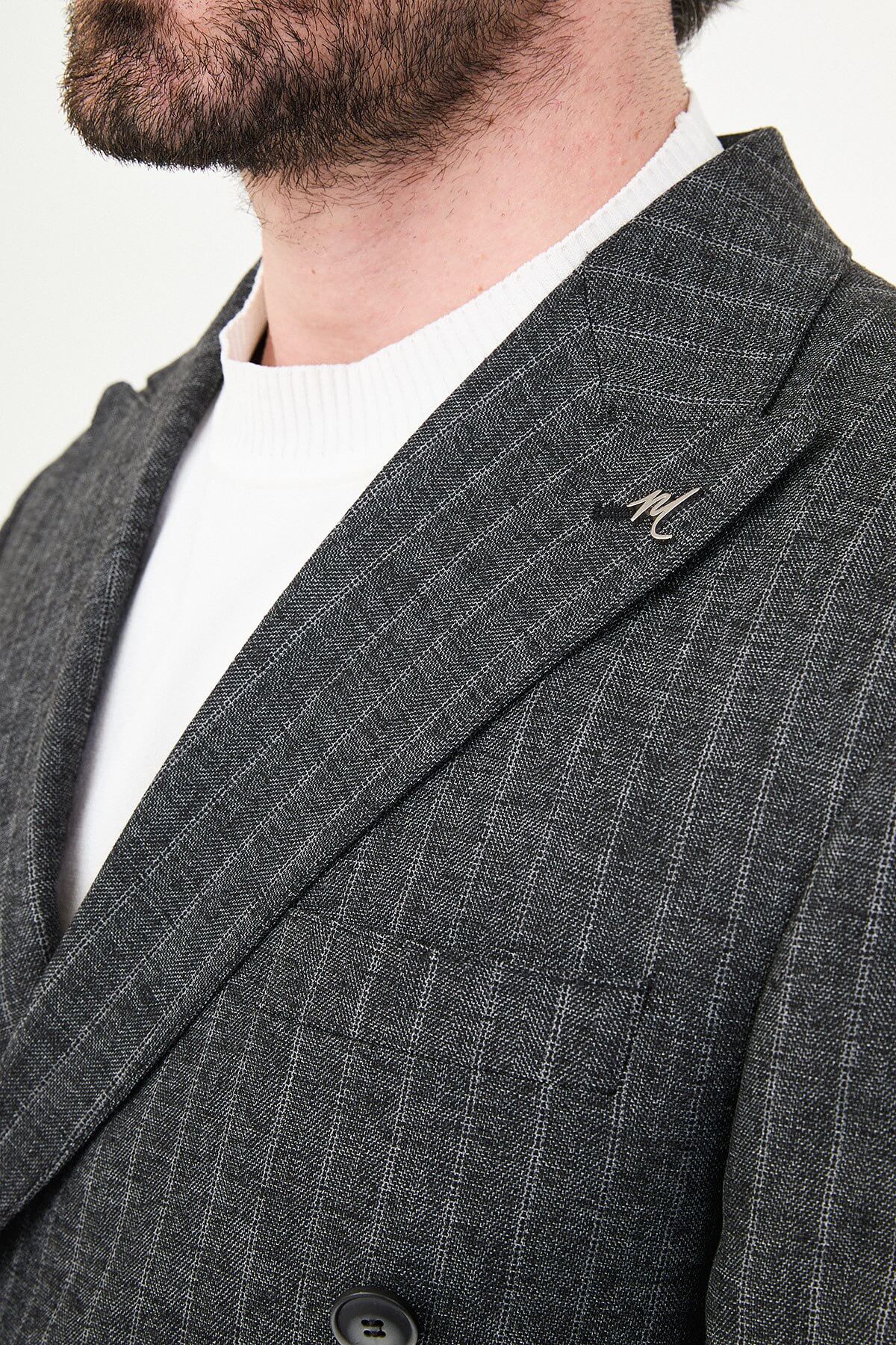 Men’s Black Charcoal Pinstripe Double-Breasted Suit on a male model, slim fit, paired with black dress shoes.