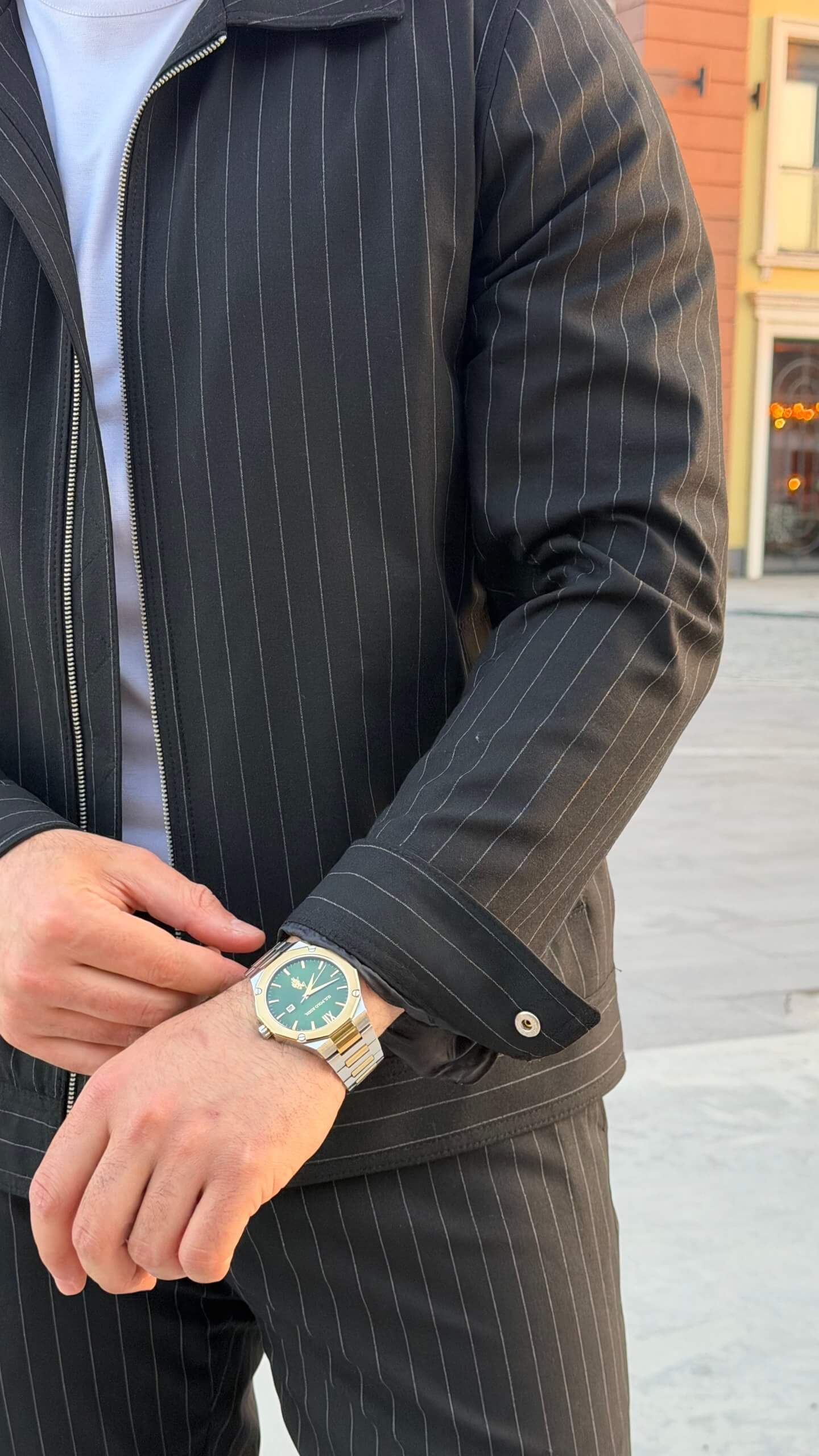 black pinstripe cargo co-set outfit, featuring a zip-front slim-fit jacket with matching cargo pants