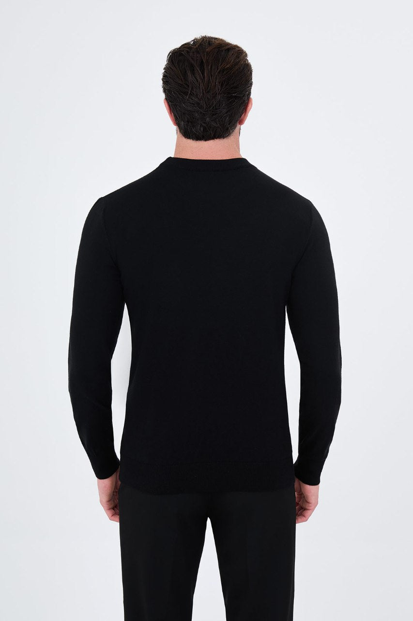 Men's black crew neck sweater with grey and white geometric colour-block panels.