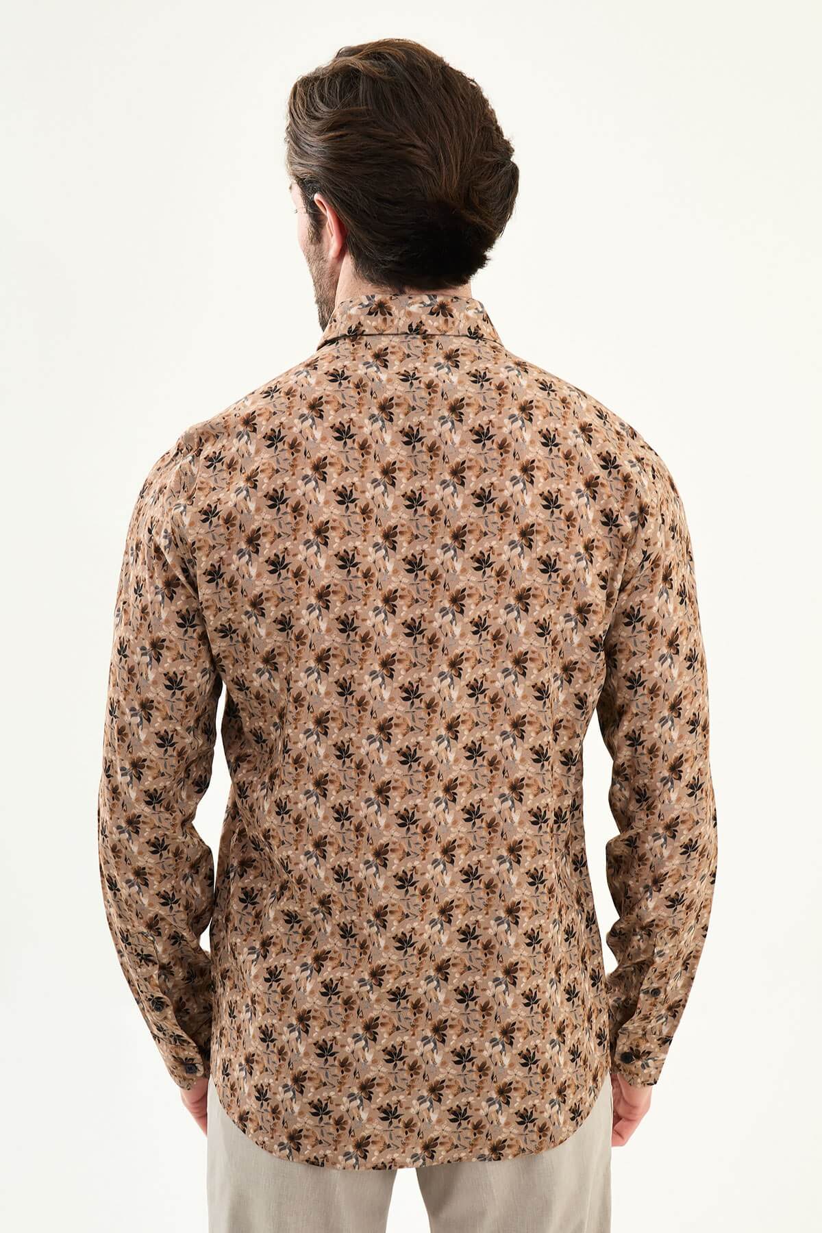 Brown slim-fit long-sleeve men’s shirt with all-over subtle pattern, structured collar, and buttoned cuffs.