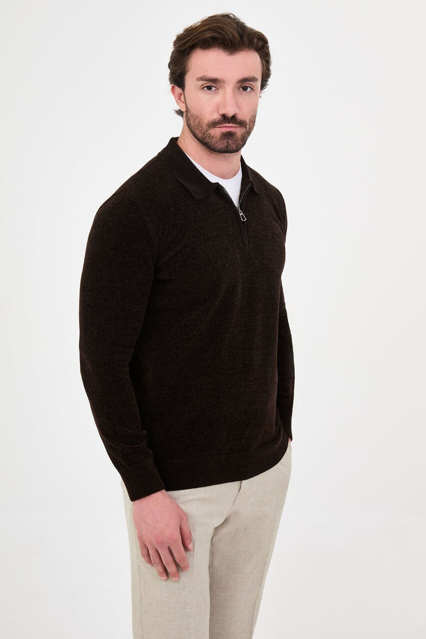 Men’s brown polo neck knit sweater with zip collar detail styled with cream trousers for a smart casual fall winter outfit.