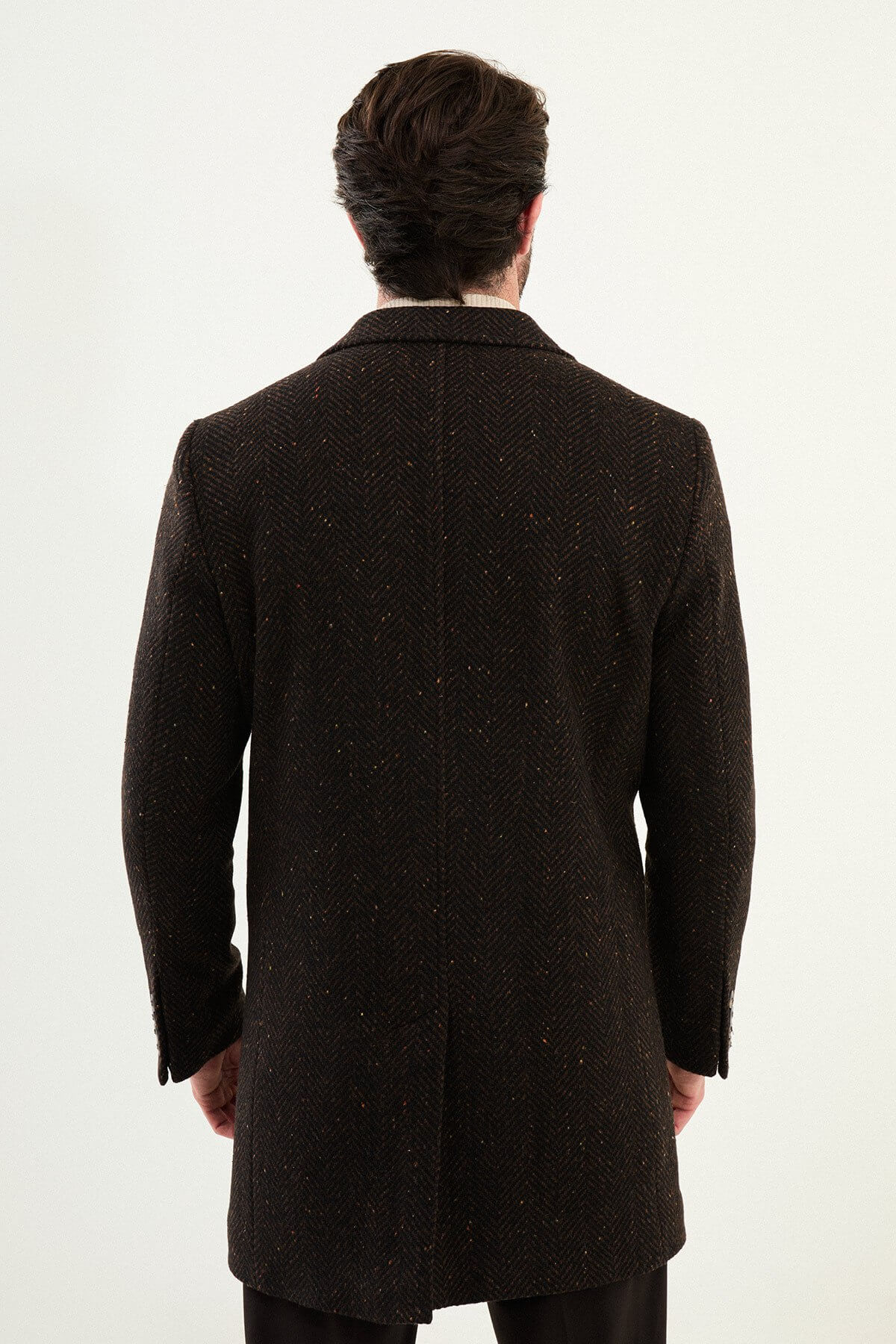 Brown wool blend tailored coat styled with beige turtleneck sweater