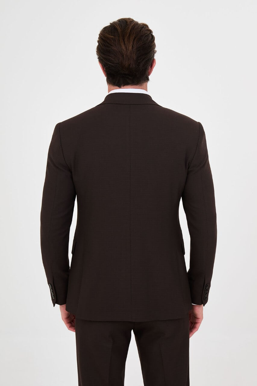 Men's brown slim-fit two-piece suit with a tailored blazer, notch lapels and matching trousers.
