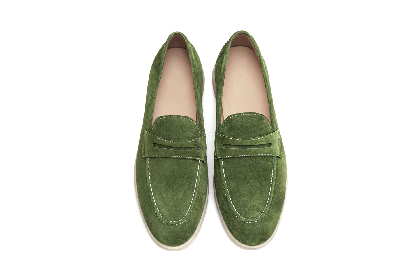 Men’s green suede leather penny loafers featuring classic vamp strap detail and lightweight sole.