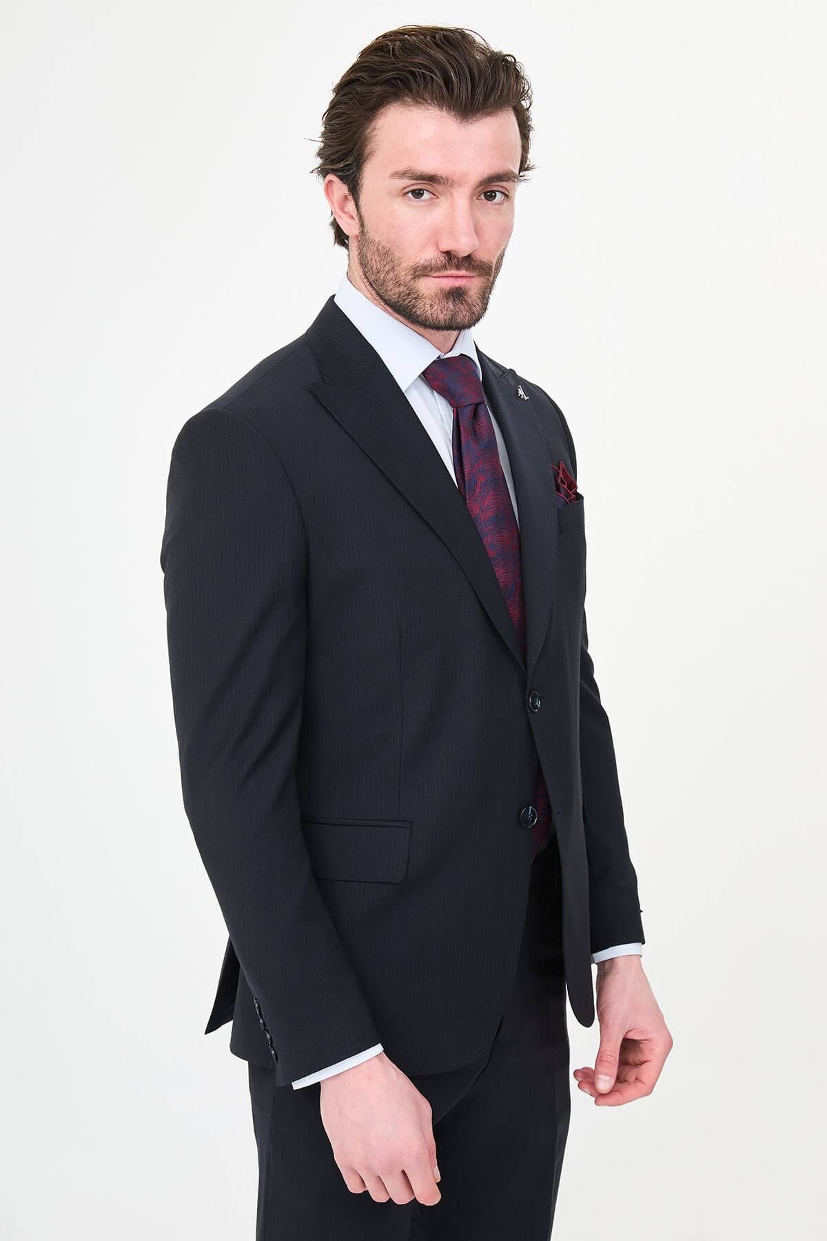 Men's Navy Blue Slim Fit Wide Collar Premium Wool Suit, showing matching trousers and dress shoes.