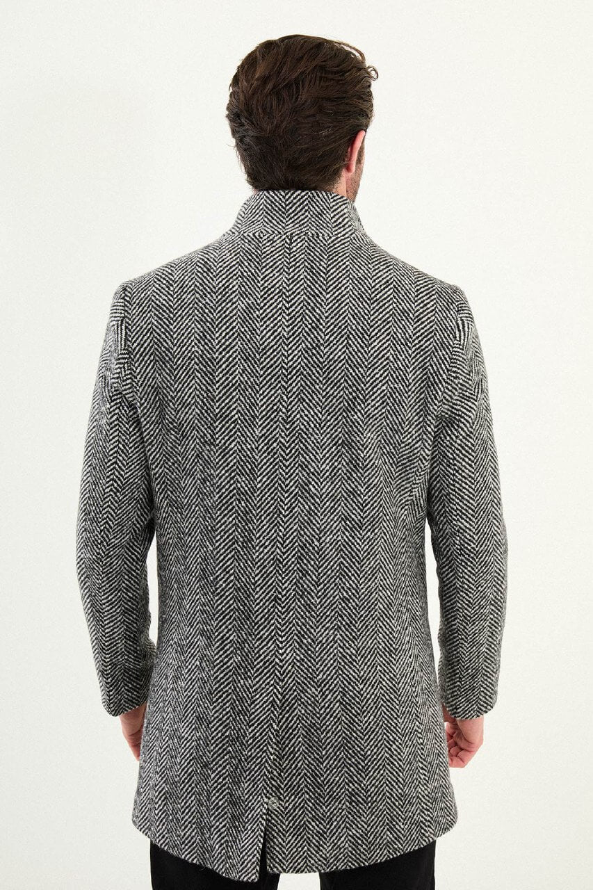Grey herringbone double-breasted men’s coat styled with black turtleneck sweater