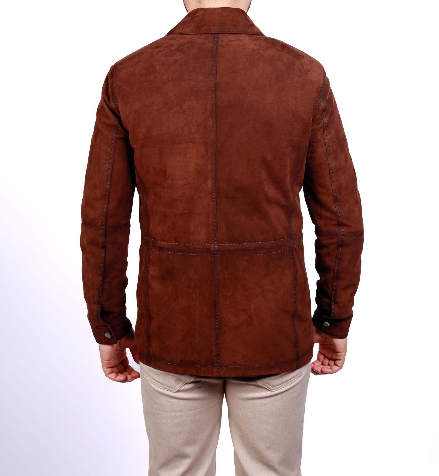 Men’s brown lamb leather suede field jacket with front pockets and button zip closure, worn over a light knit sweater.