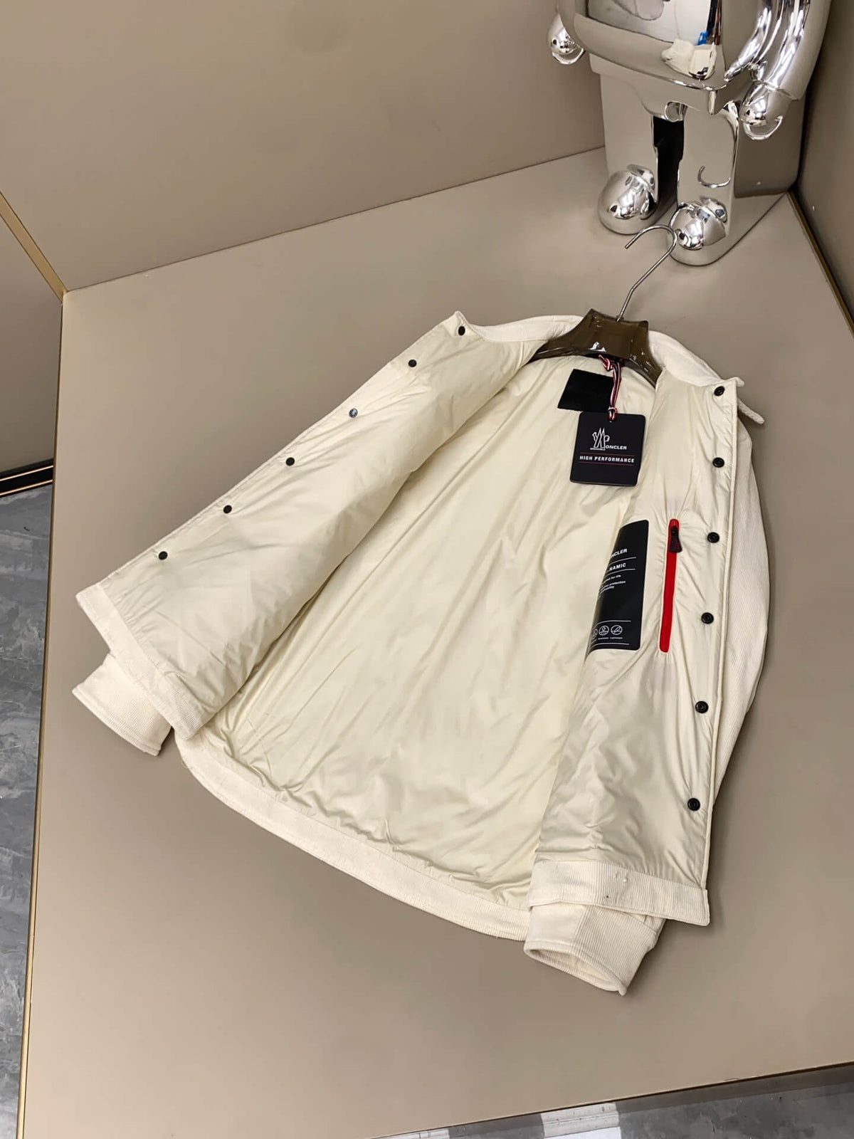 Cream corduroy down shirt jacket with quilted lining and buttoned chest pockets, Moncler-inspired design.