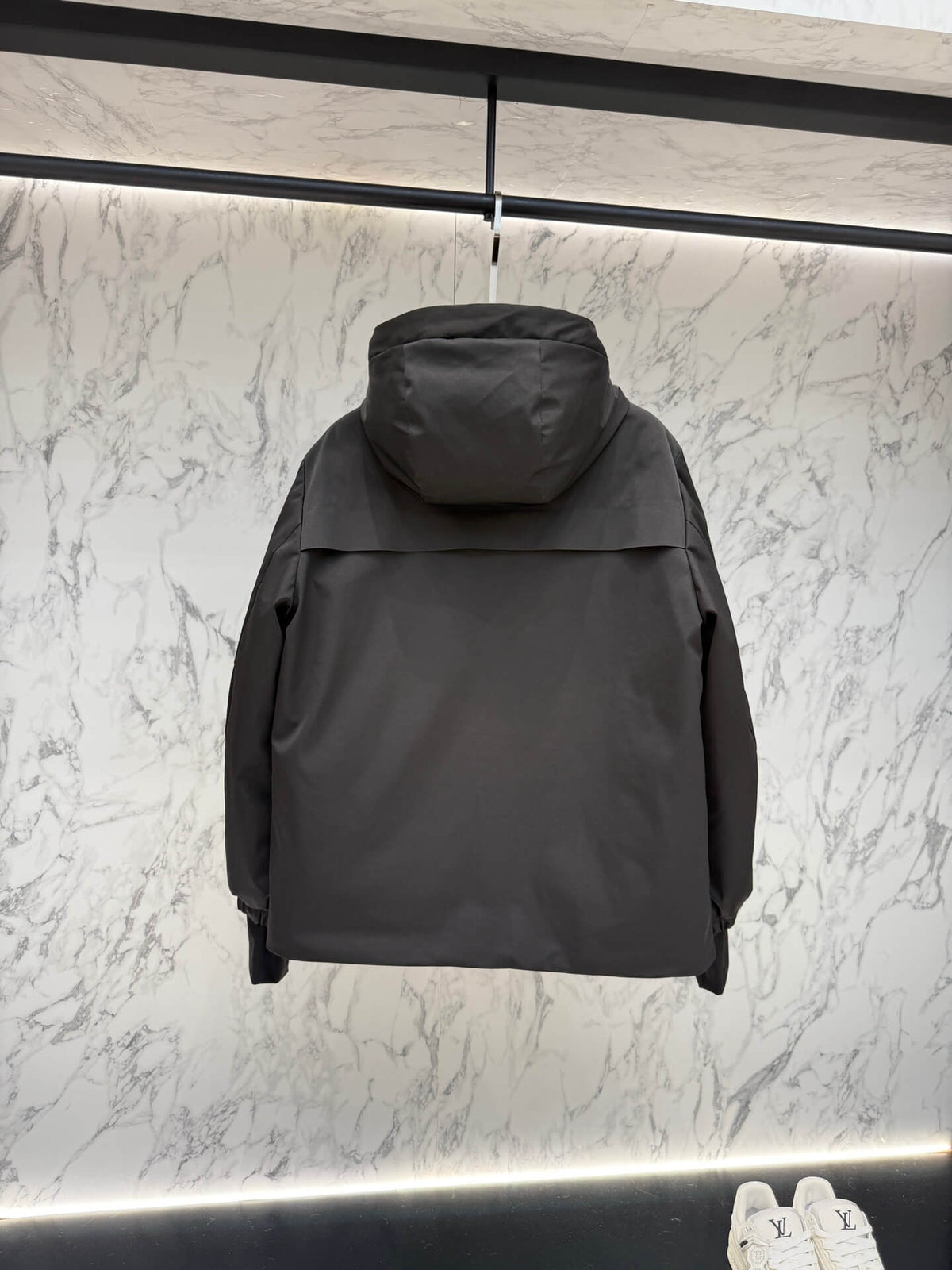 Moncler Maya Black Short Down Jacket open view showing quilted interior and label.