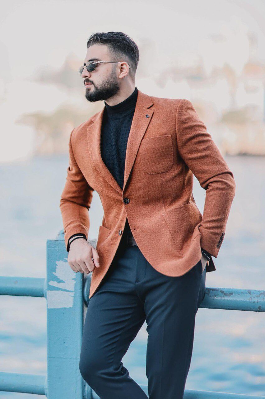 Men’s hazelnut wool slim-fit mono-collar coat styled with black turtleneck