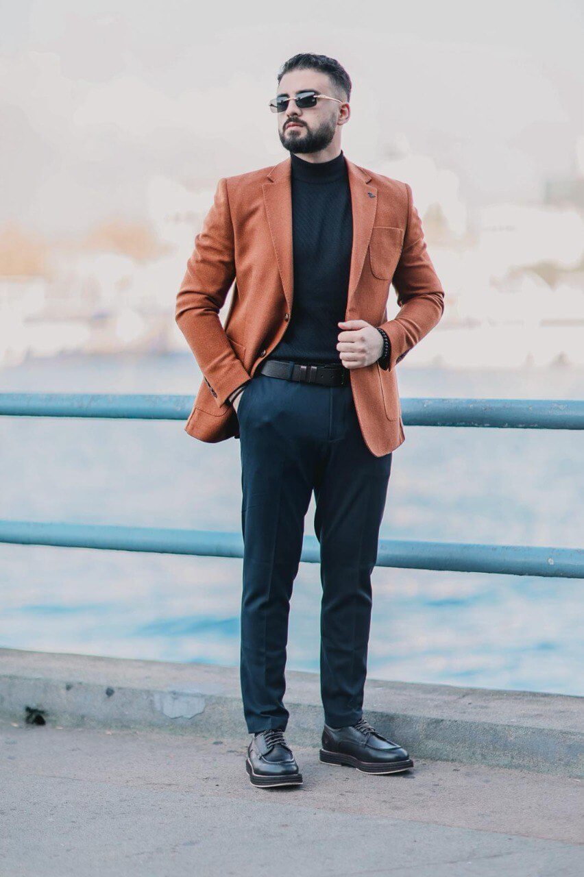 Men’s hazelnut wool slim-fit mono-collar coat styled with black turtleneck