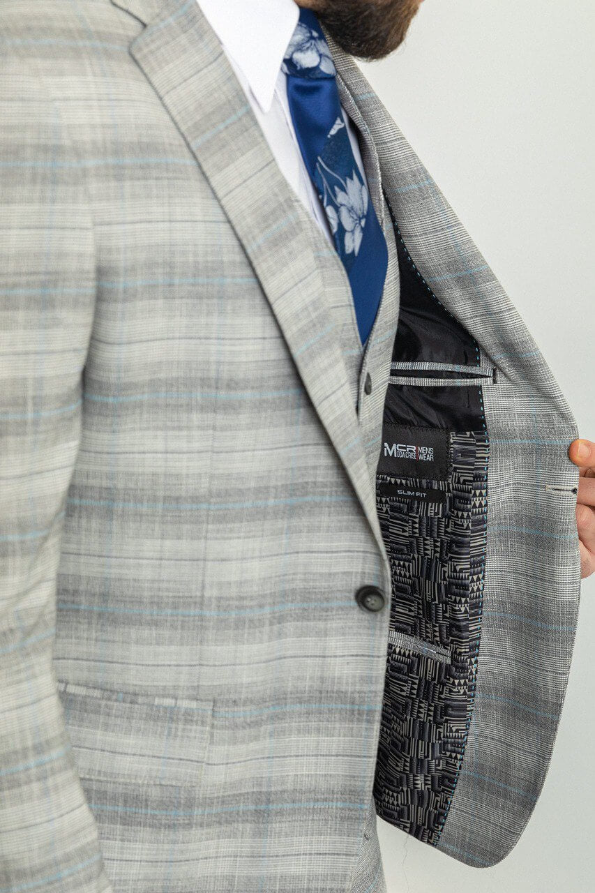 A Patterned Gray Blue Suit on Display.