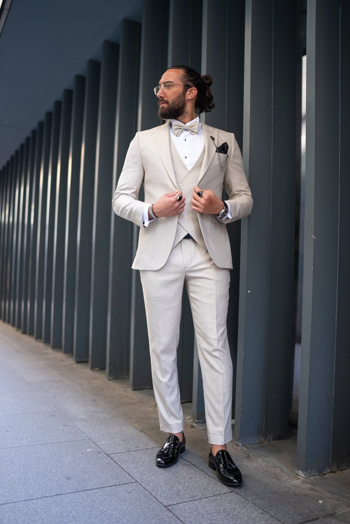 Beige three piece tuxedo waistcoat layering detail view
