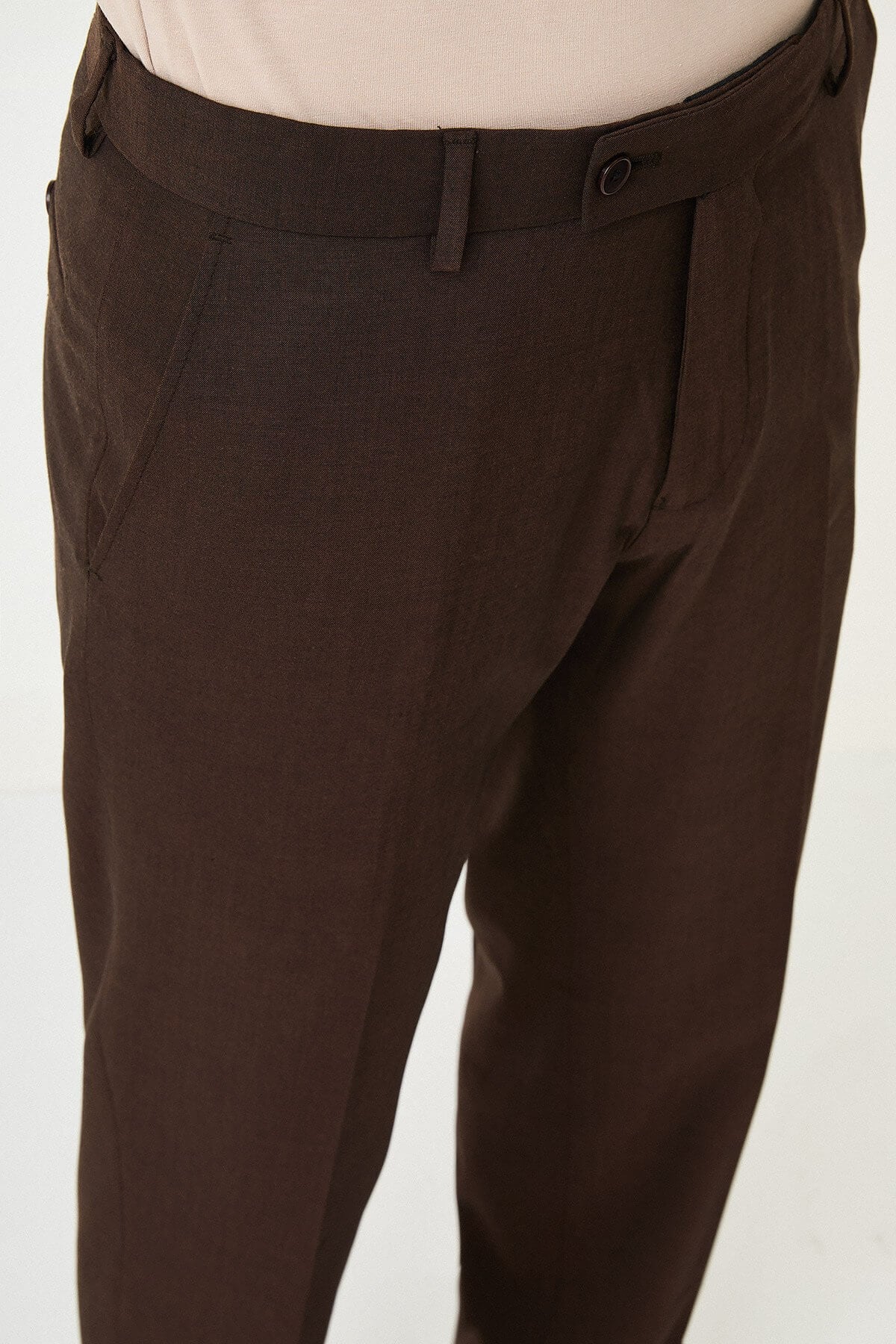 Men wearing dark brown slim-fit formal trousers with brown dress shoes, styled for summer office and formal events.