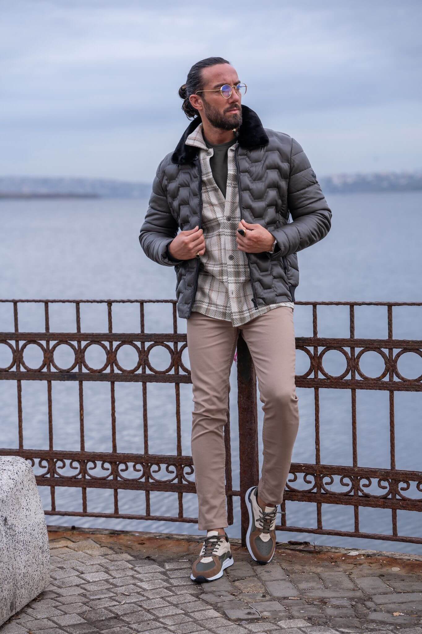 Modern masculinity embodied: our male model rocks the khaki bomber jacket.