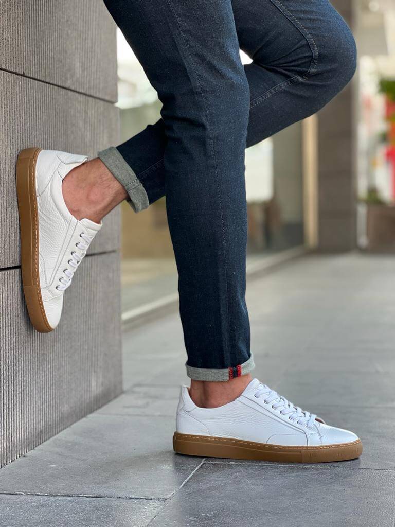 White floater leather sneakers with EVA sole, featuring a minimalist low-cut design ideal for spring and summer casual wear.