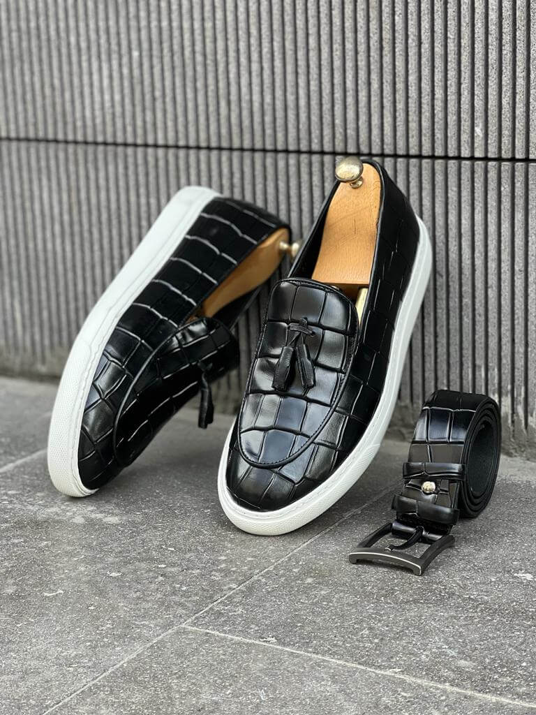 Black leather tassel loafers with a white EVA sole, slip-on design for effortless summer style and lightweight wearability.