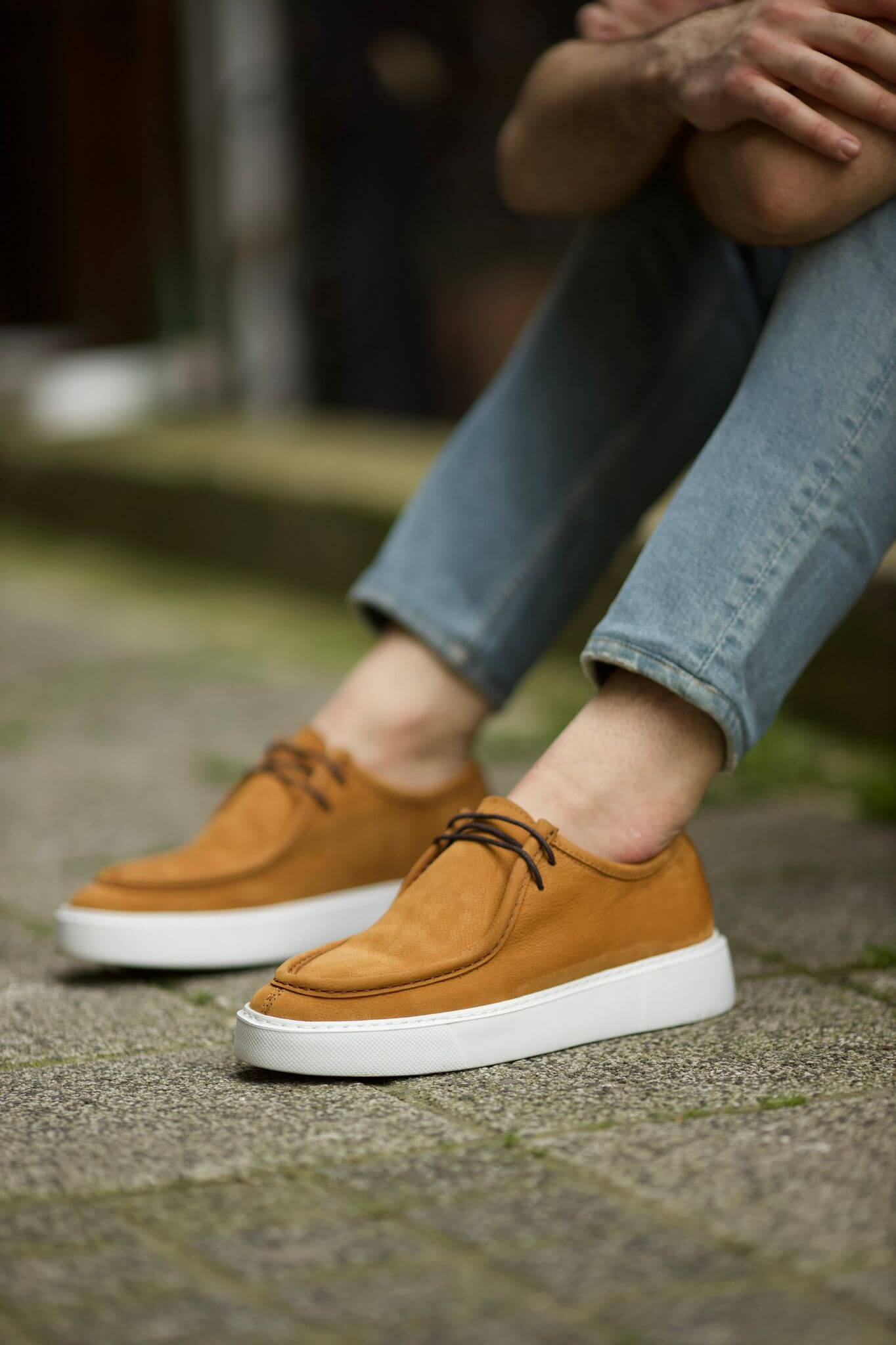 A Camel Casual Lace Up Shoe  on display.