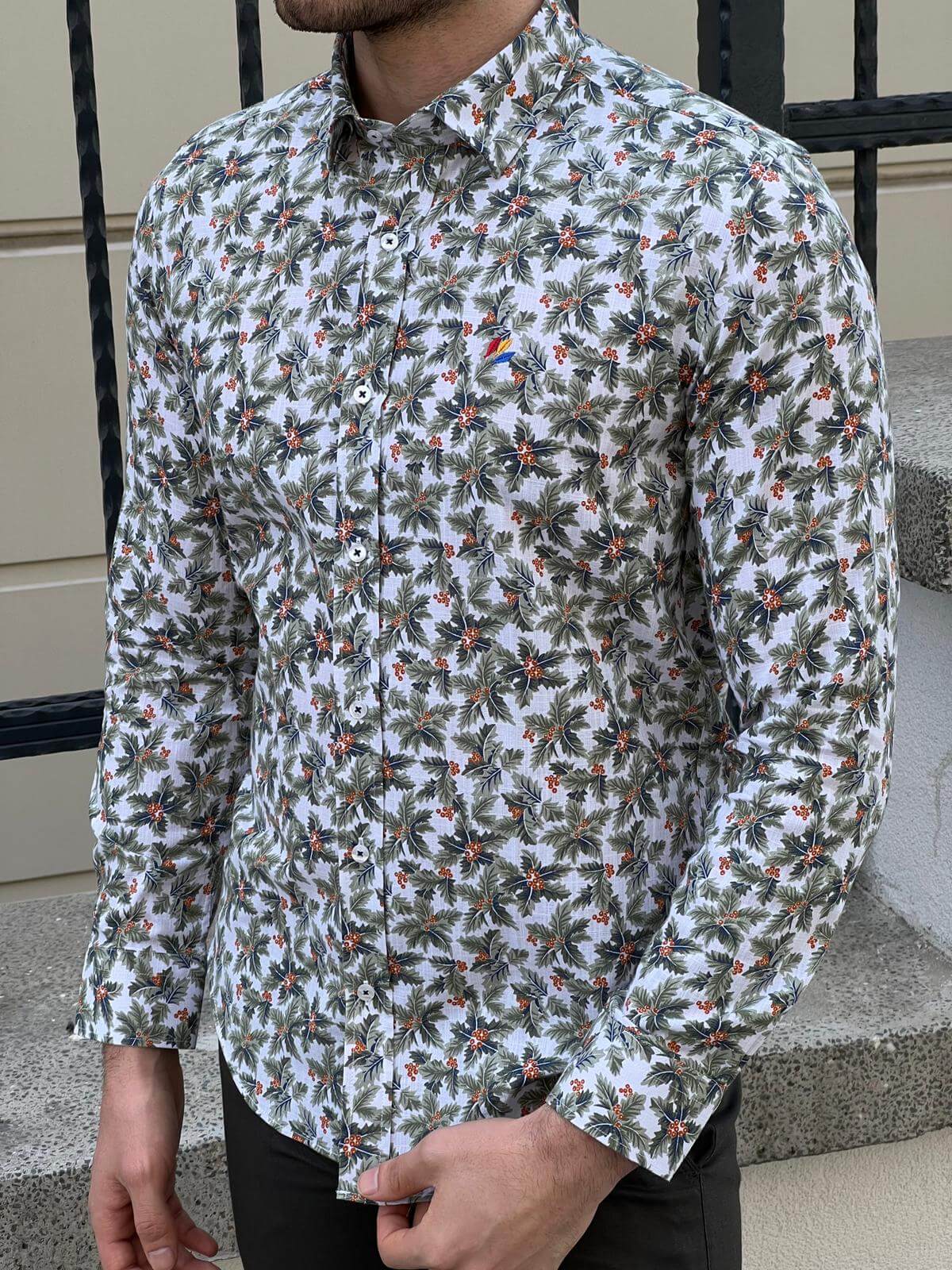 A stylish green shirt adorned with beautiful flowers