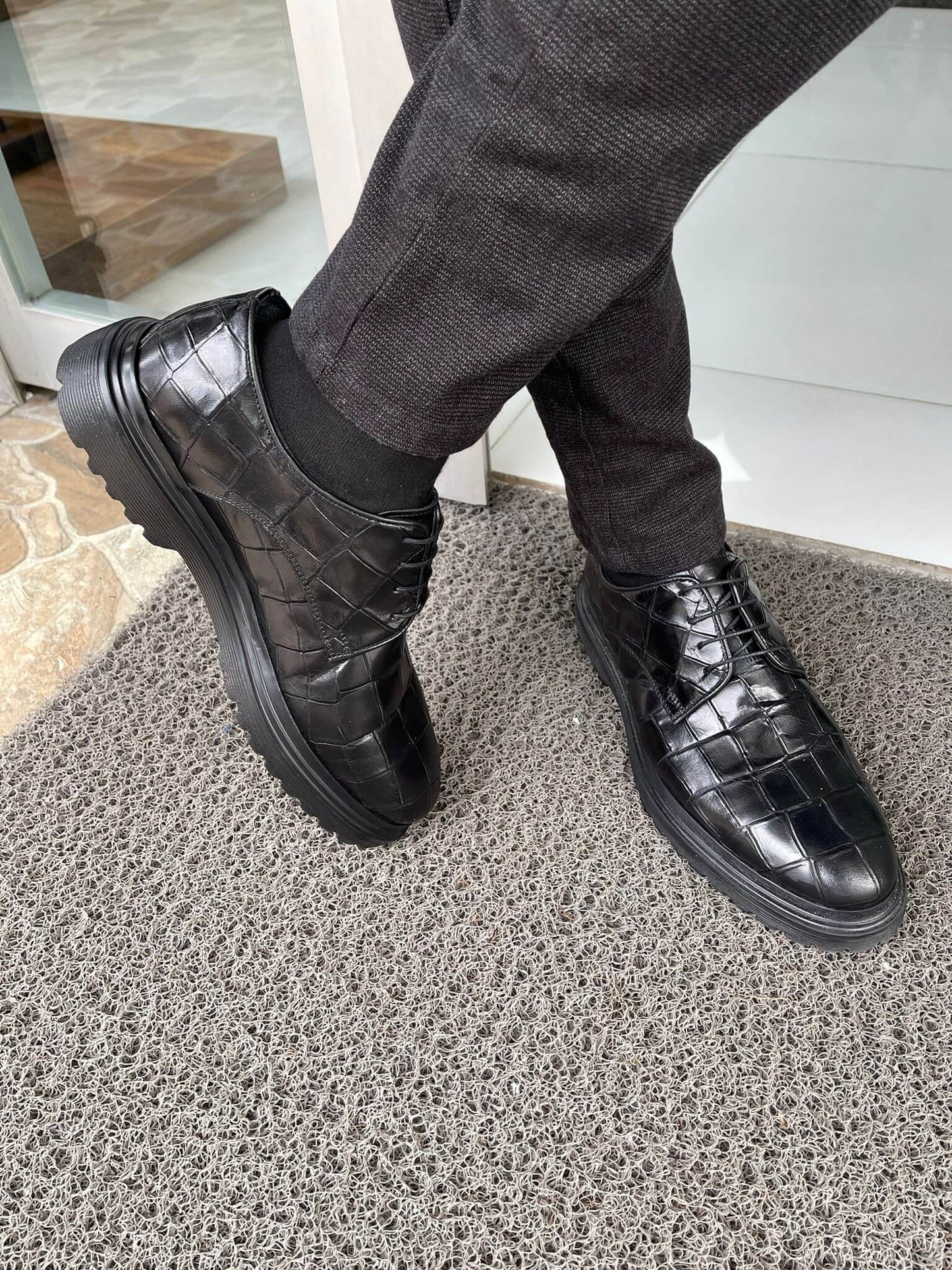 Classic black leather Derby shoes with lace-up closure and EVA sole, perfect for formal and smart-casual wear.