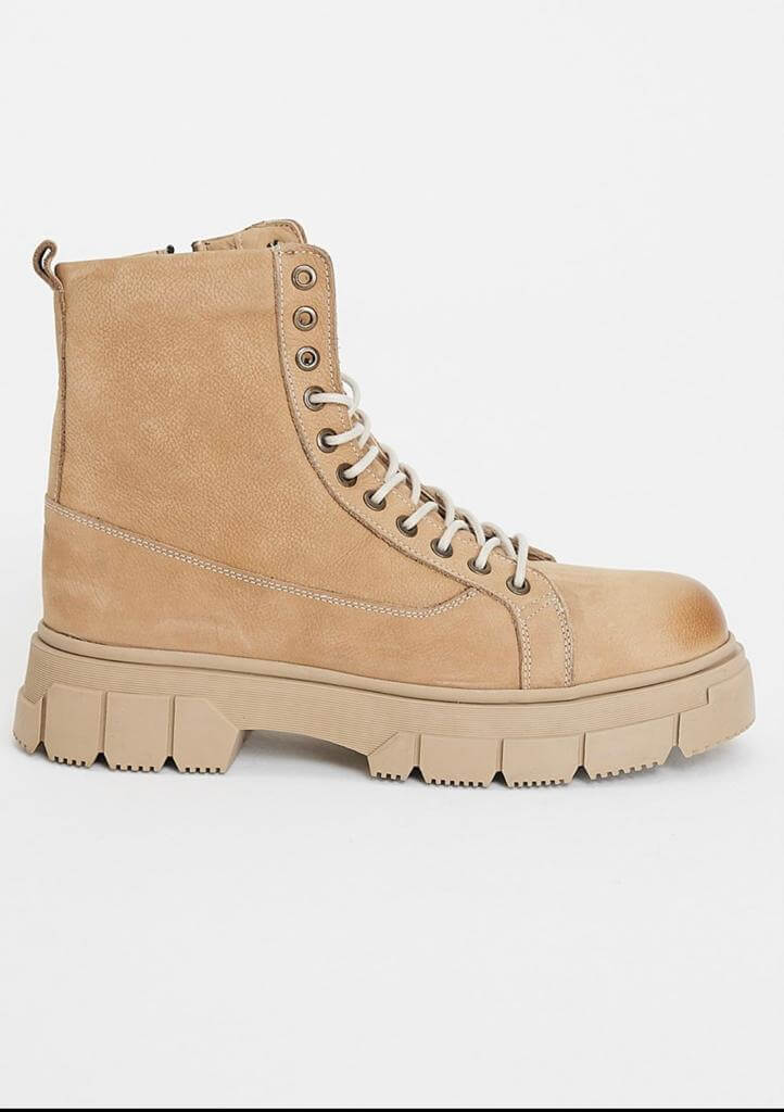 Monteverde Beige Lace Up Boots shown side-by-side against a plain white background, highlighting the structured design, eyelets, and contrast stitching.