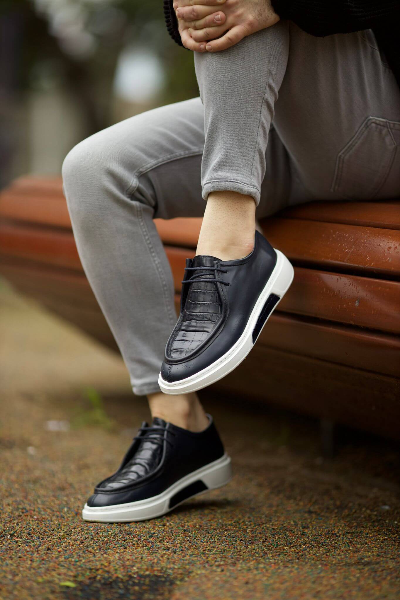 A Navy Blue Detailed Design Shoe on display.