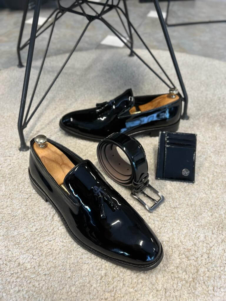 Berlin black leather tassel loafers with a neolite sole, designed for fall-winter smart casual and formal wear.