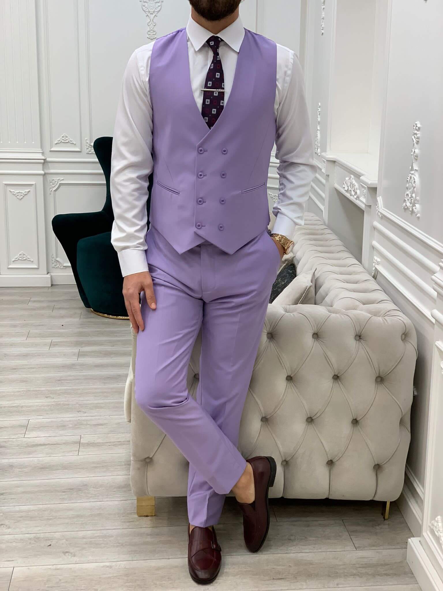 Model confidently showcasing HolloMen's Purple Slim Fit Suit, accentuating its sleek design and vibrant color.