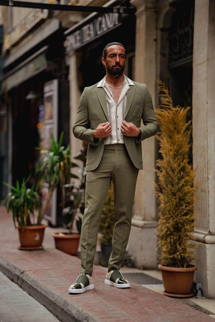 A Slim Fit Green Suit on display