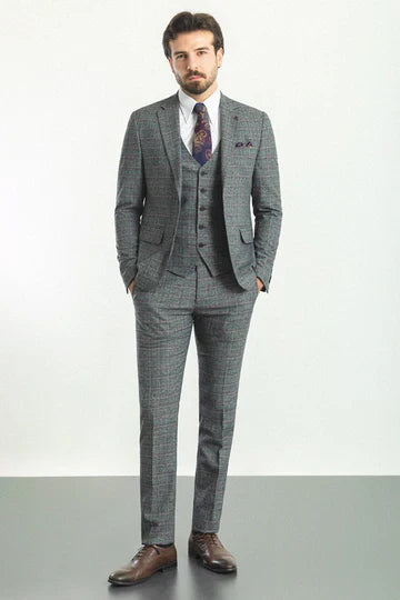 Men's dark grey patterned three piece suit.