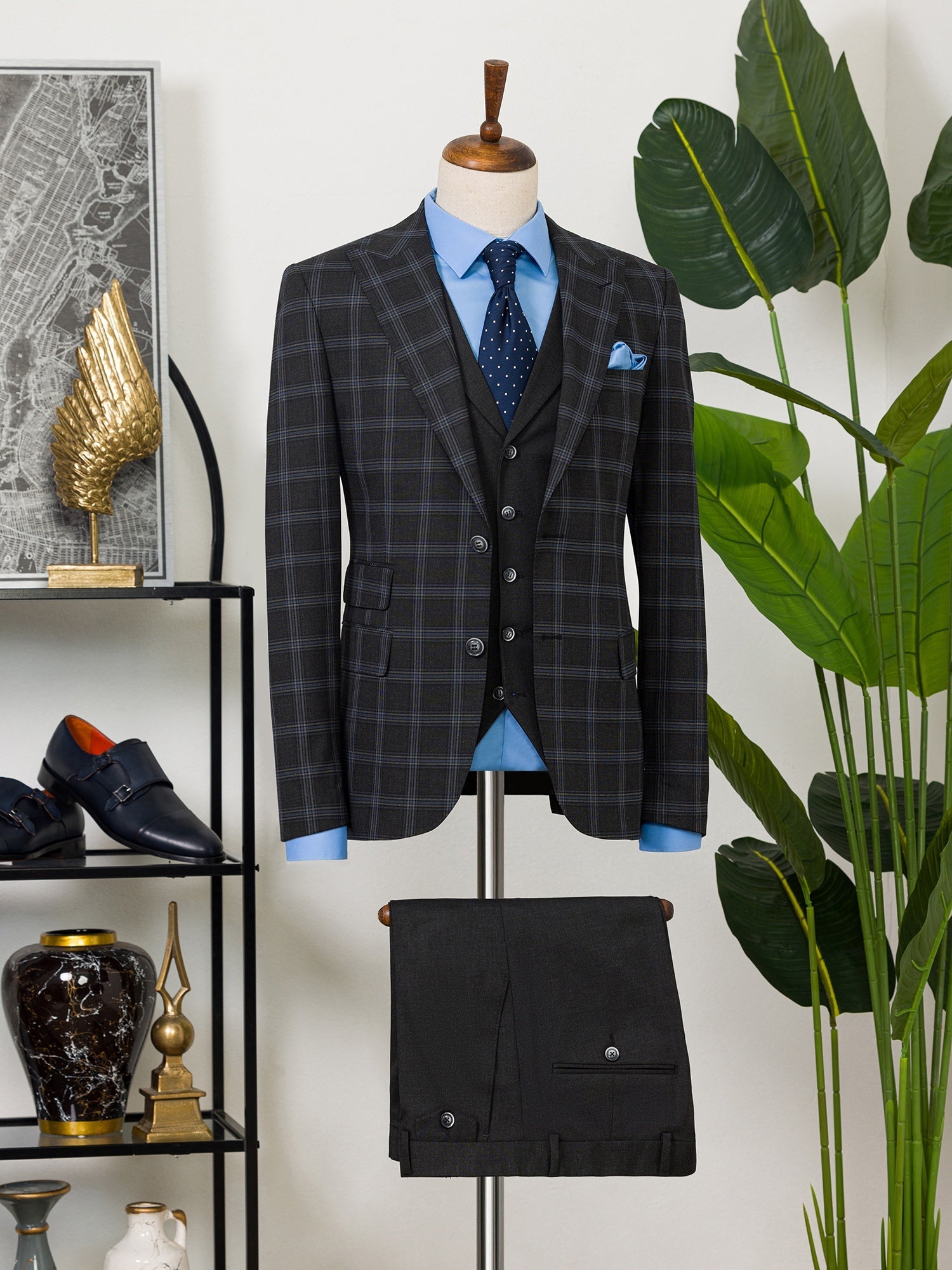 Men’s navy plaid slim-fit 3-piece suit with peak lapel blazer, matching vest and trousers, styled for business and formal occasions with a modern tailored fit.