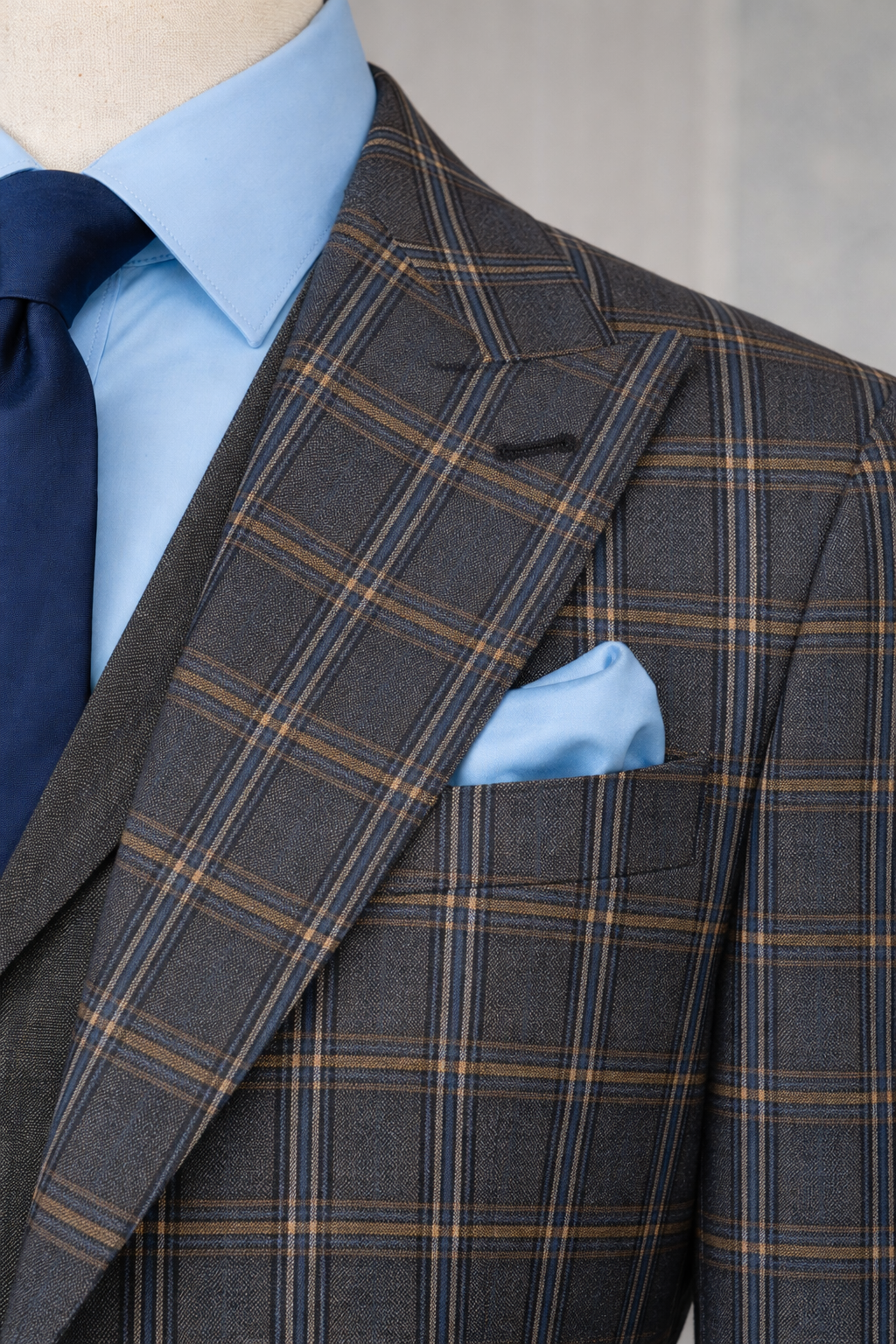 Men’s Navy Plaid Slim-Fit Peak Lapel 3-Piece Suit.