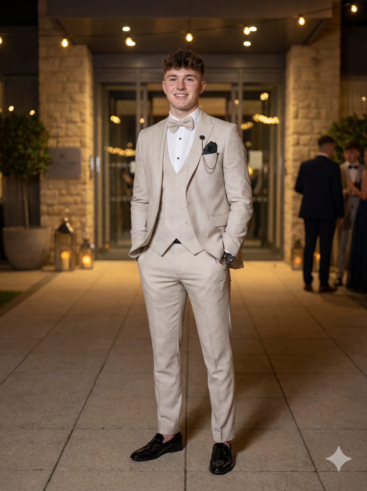 Modern beige prom suit with vest and bow tie for prom night