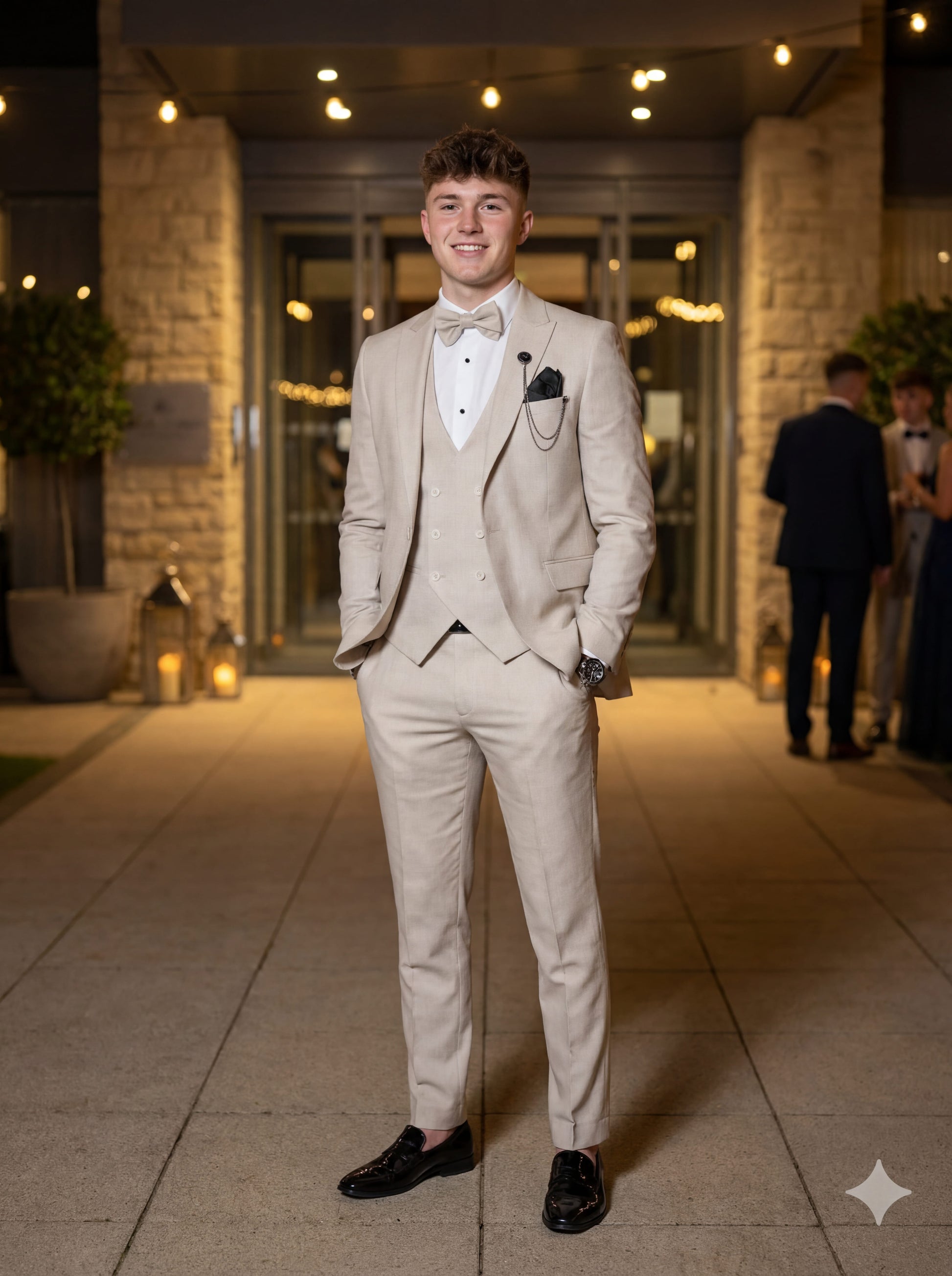 Modern beige prom suit with vest and bow tie for prom night