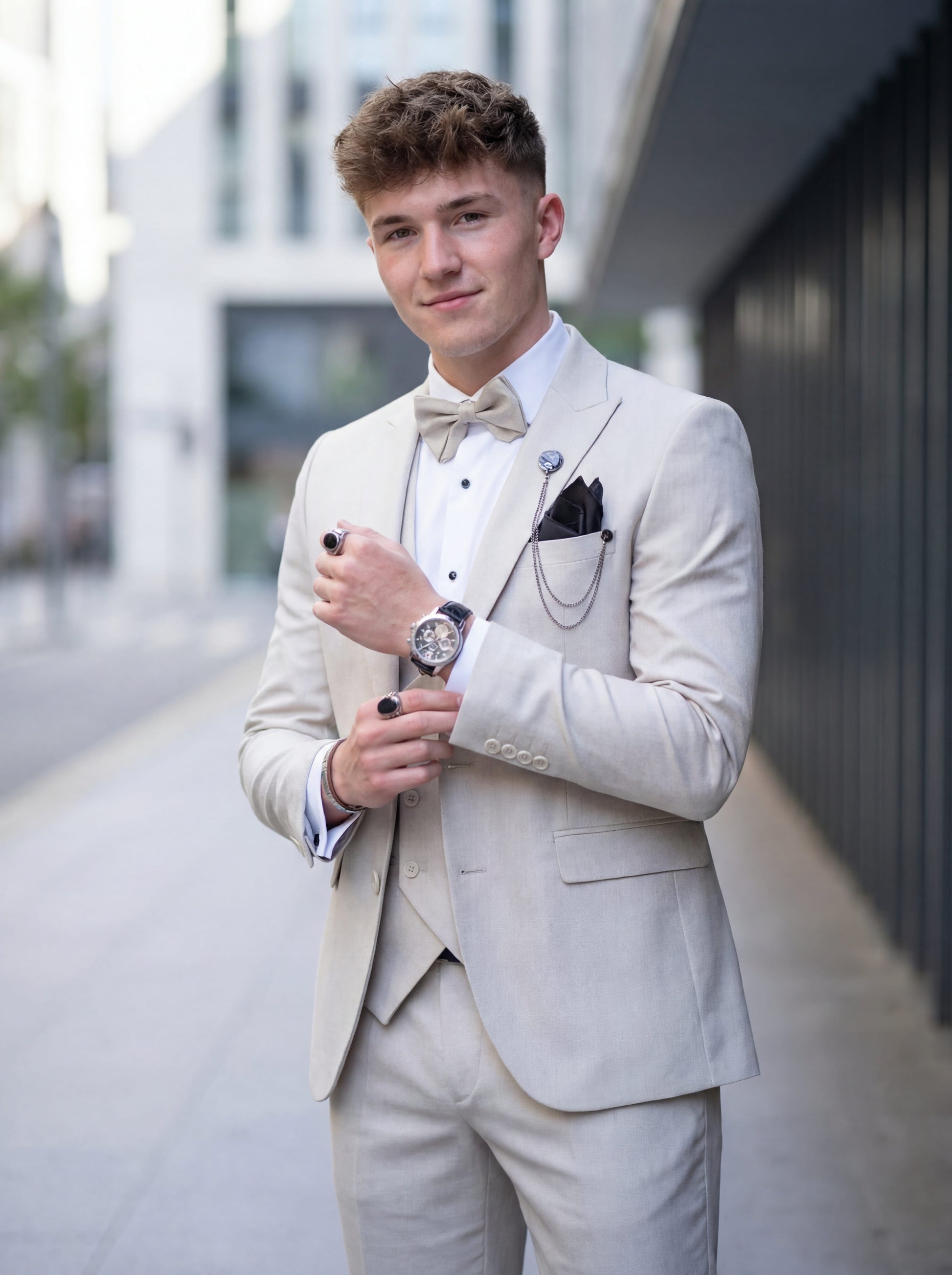 Modern beige prom suit with vest and bow tie for prom night