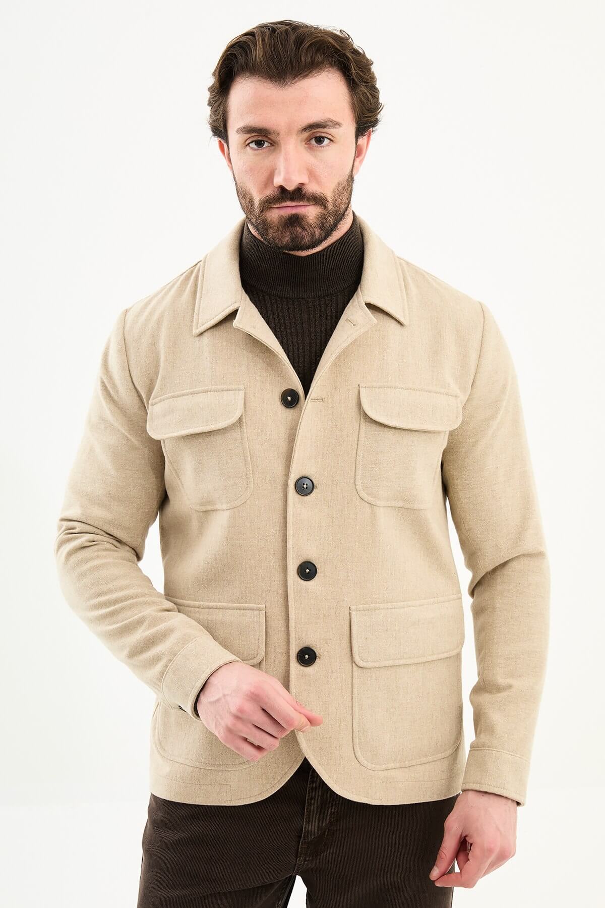 Men’s beige wool blend utility jacket with button-up front and four pockets, regular fit smart casual layering jacket styled with brown trousers and dark turtleneck sweater