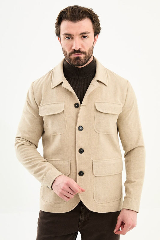 Men’s beige wool blend utility jacket with button-up front and four pockets, regular fit smart casual layering jacket styled with brown trousers and dark turtleneck sweater