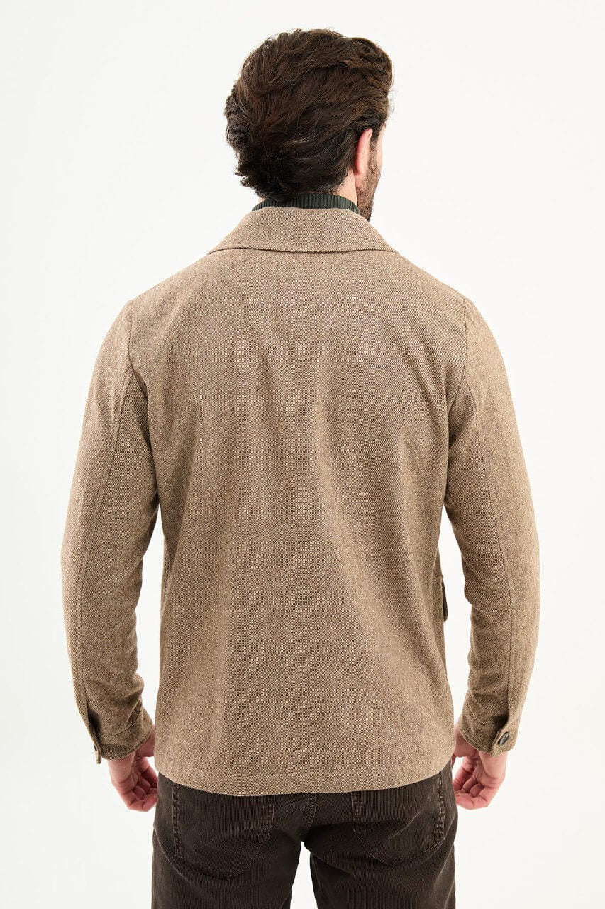 Men’s camel wool blend utility jacket with button-up front and four pockets, regular fit smart casual layering jacket styled with brown trousers and dark green turtleneck sweater