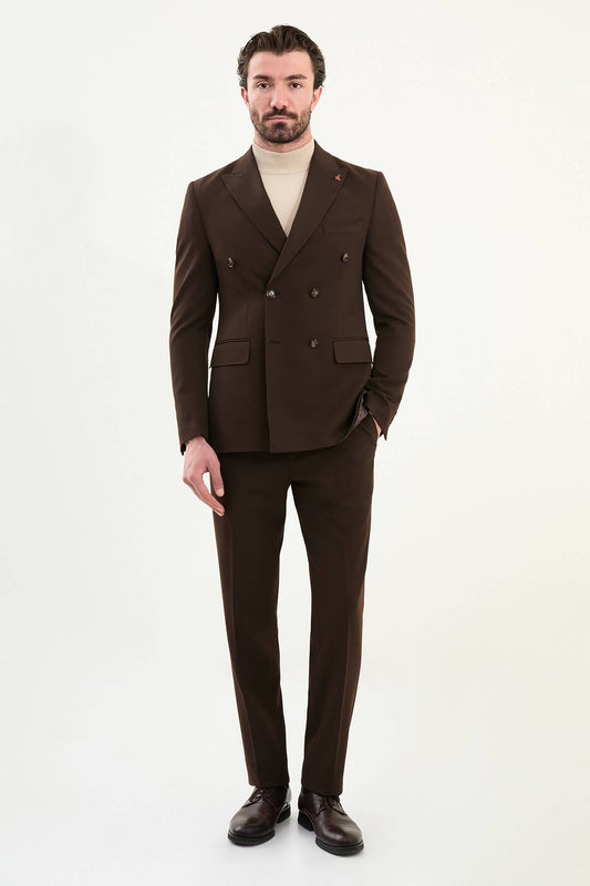 Men wearing chocolate brown slim-fit double-breasted wool-blend suit with peak lapels and cream turtleneck, winter formal outfit.