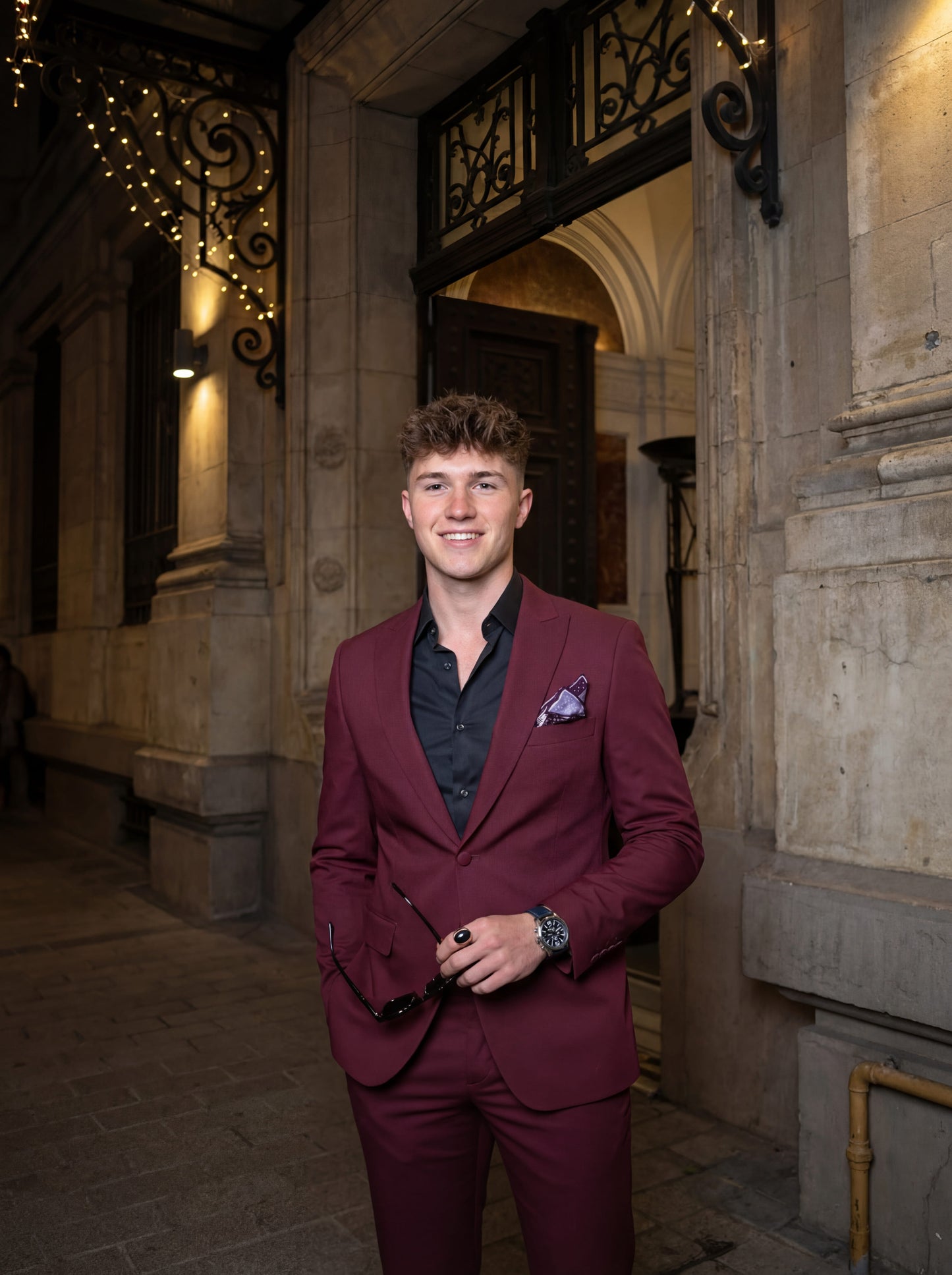 Burgundy slim fit prom tuxedo styled for formal evening event
