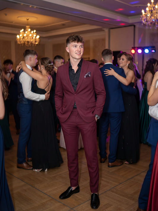 Burgundy slim fit prom tuxedo styled for formal evening event