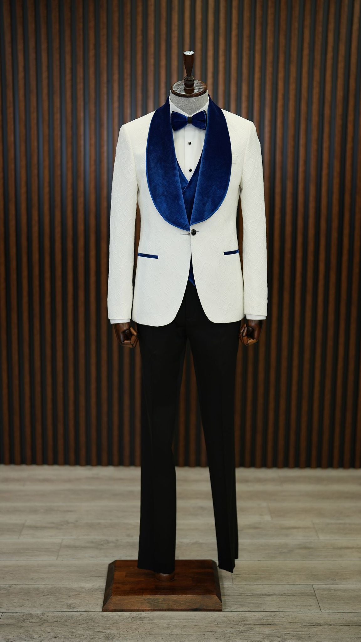 A Blue and White Tuxedo Suit on display.
