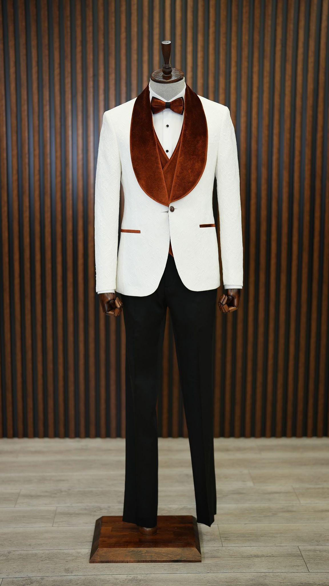 A Brown and White Tuxedo Suit on display.