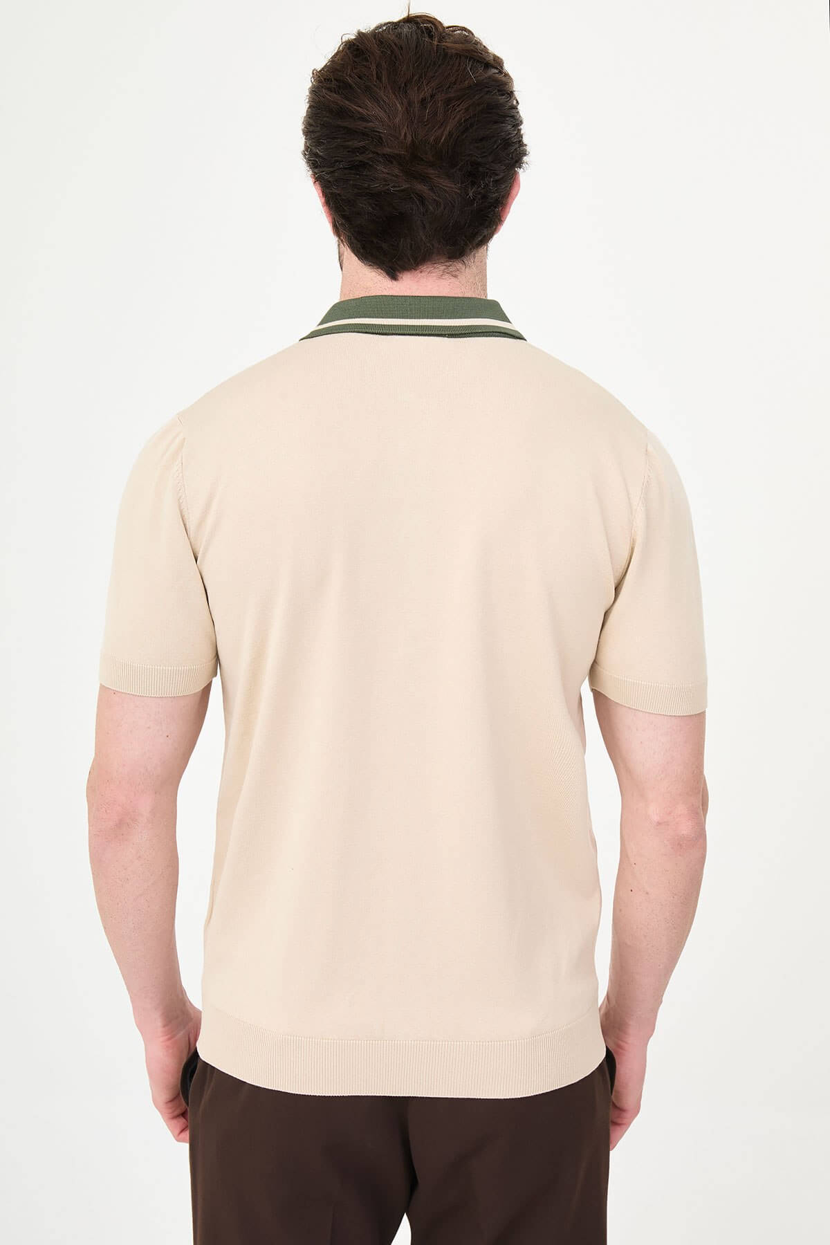 Men’s beige short sleeve knit polo shirt with button front, green tipped collar, textured side panels, slim fit smart casual style