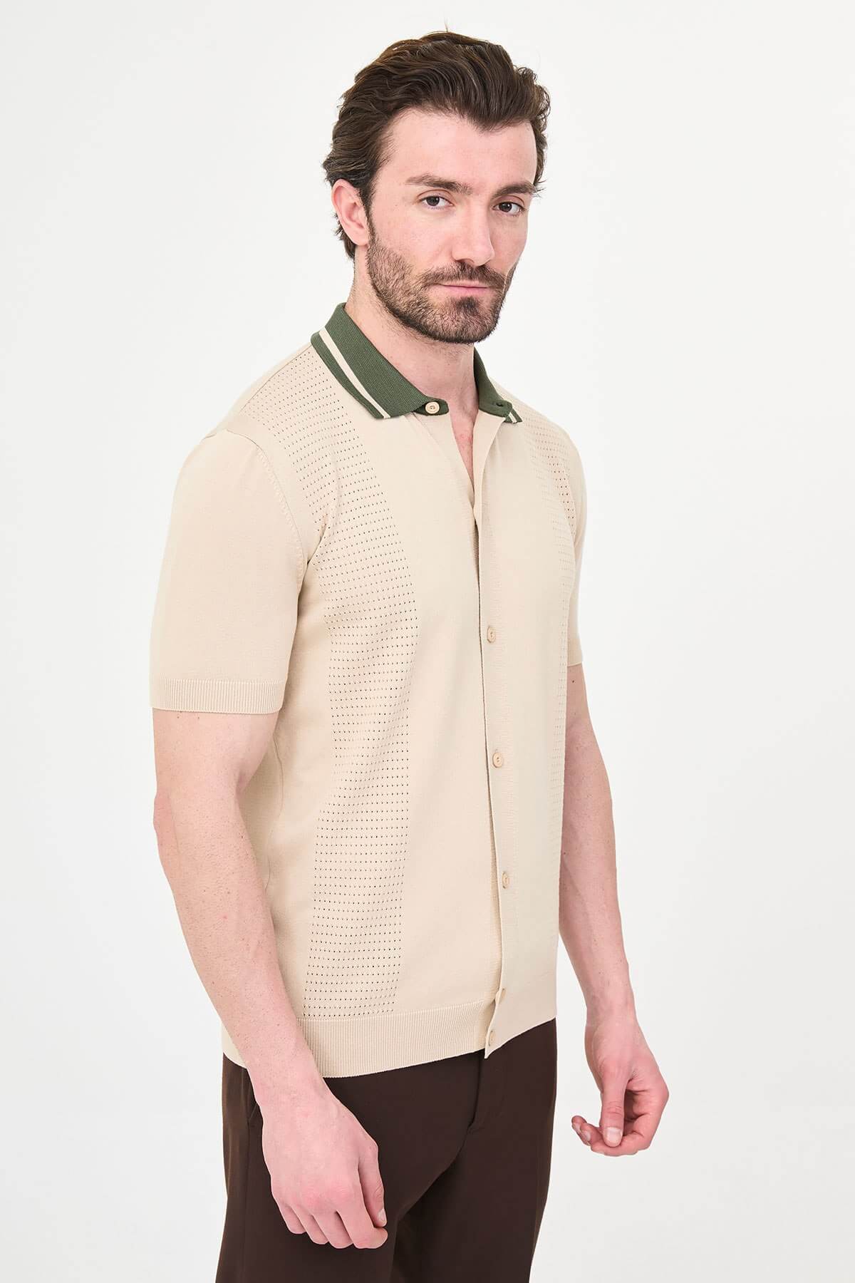 Men’s beige short sleeve knit polo shirt with button front, green tipped collar, textured side panels, slim fit smart casual style