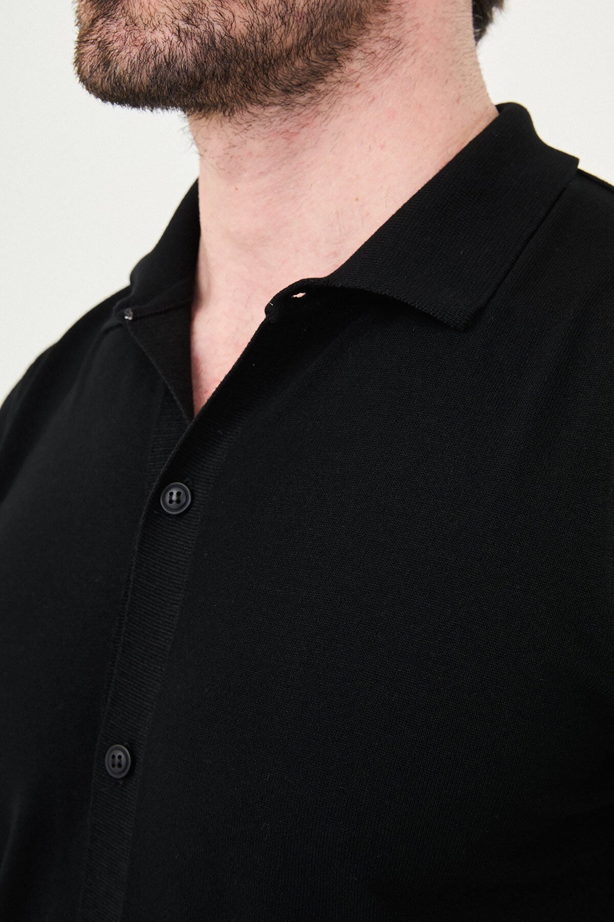 Men’s black slim fit short sleeve knitwear shirt with button-up front, lightweight viscose fabric, modern smart casual style